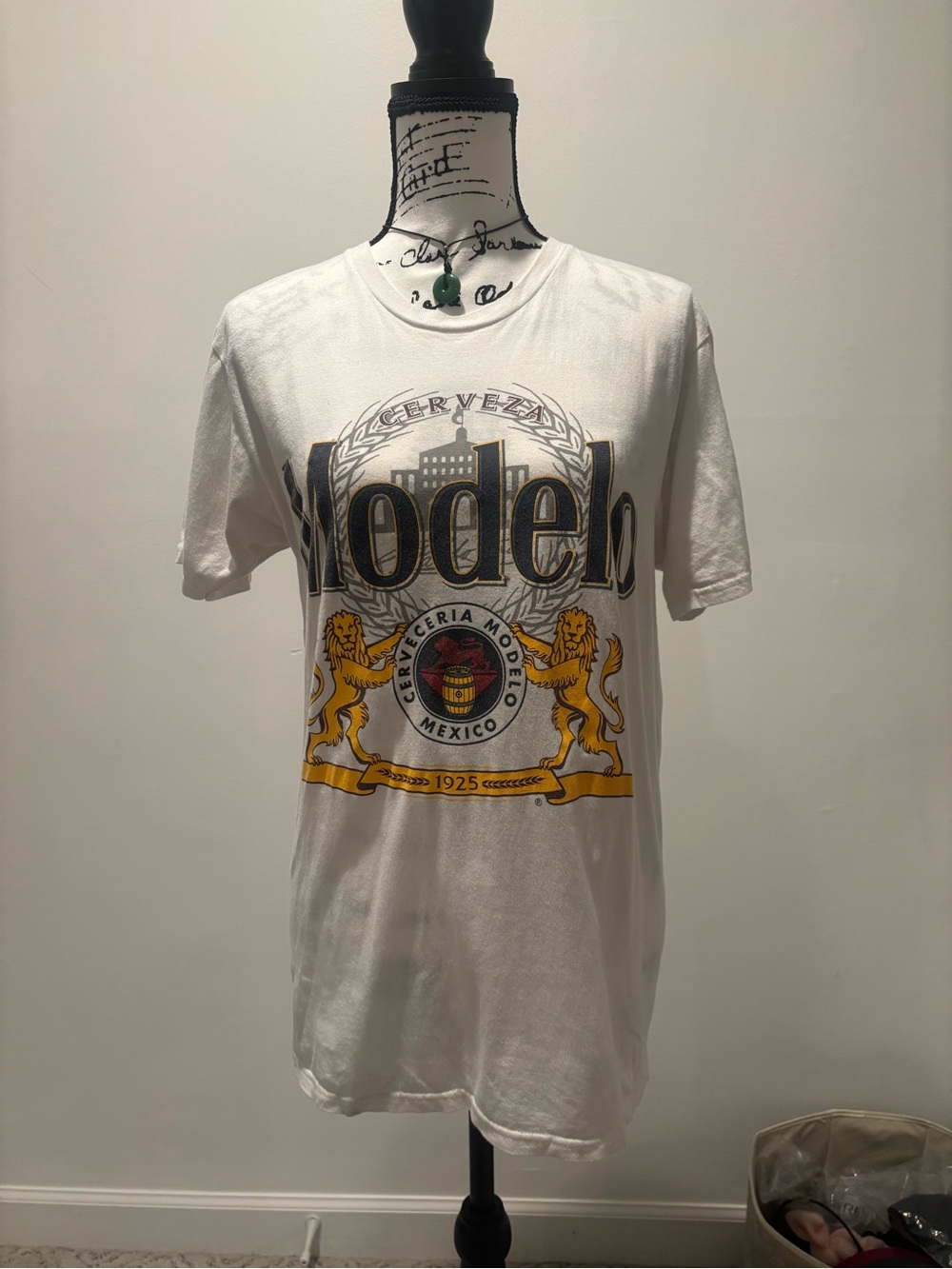 ModelCo White Tee with Yellow and Black Crest Graphic